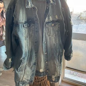 Long jean jacket with rips